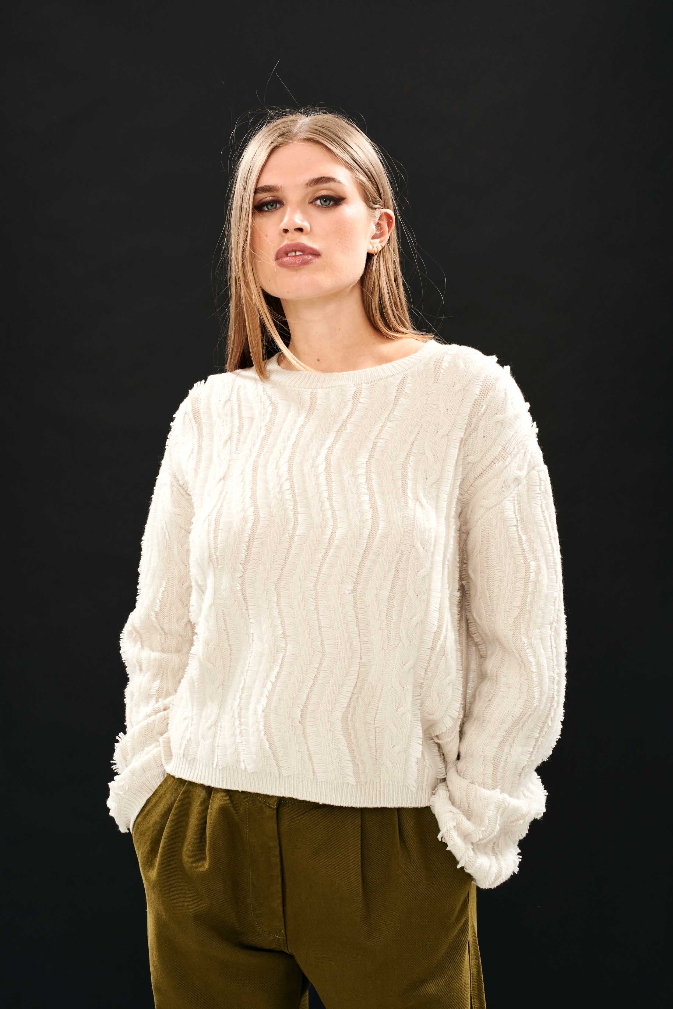 Female model wearing Female model wearing Jumper 1234 stone crew neck jumper in our wonderful cashmere and wool blend with all over raw cut cable detail slightly oversized fit