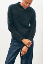 Female model wearing Jumper1234 Cashmere Brushed Turtle in Black