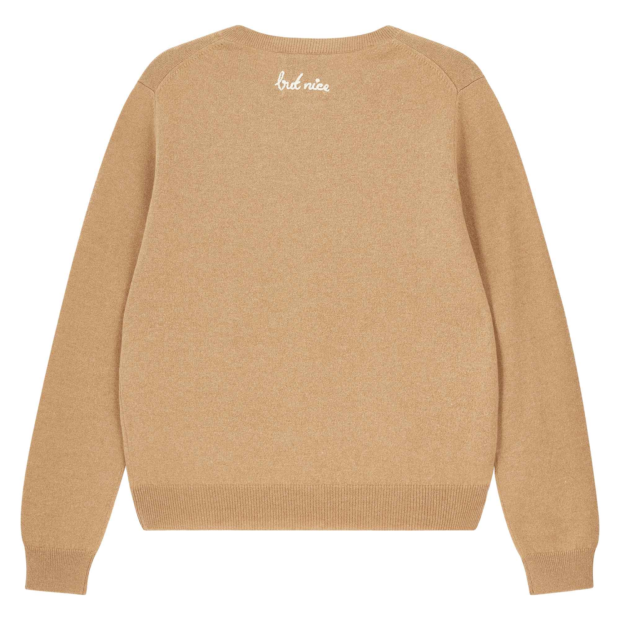 Jumper 1234 Camel cashmere crew neck jumper with cream 'naughty' chain stitch embroidery on the chest and 'but nice' on the back. Back shot