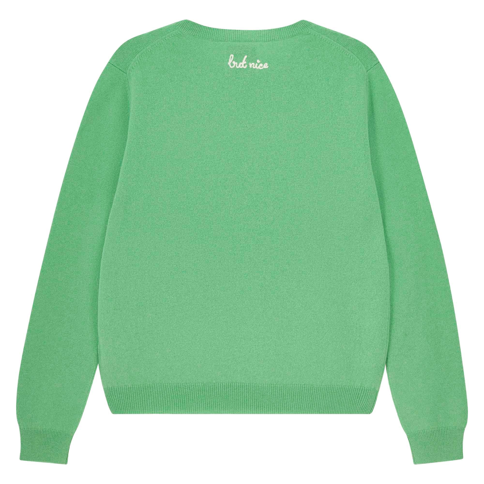 Jumper 1234 Green cashmere crew neck jumper with cream 'naughty' chain stitch embroidery on the chest and 'but nice' on the back. Back shot