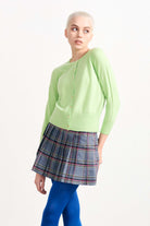 Blonde female model wearing Jumper 1234 Lime Green cashmere cardigan