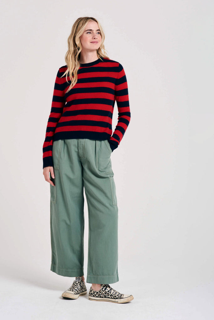 Blonde female model wearing Jumper1234 stripe cashmere crew in navy and red