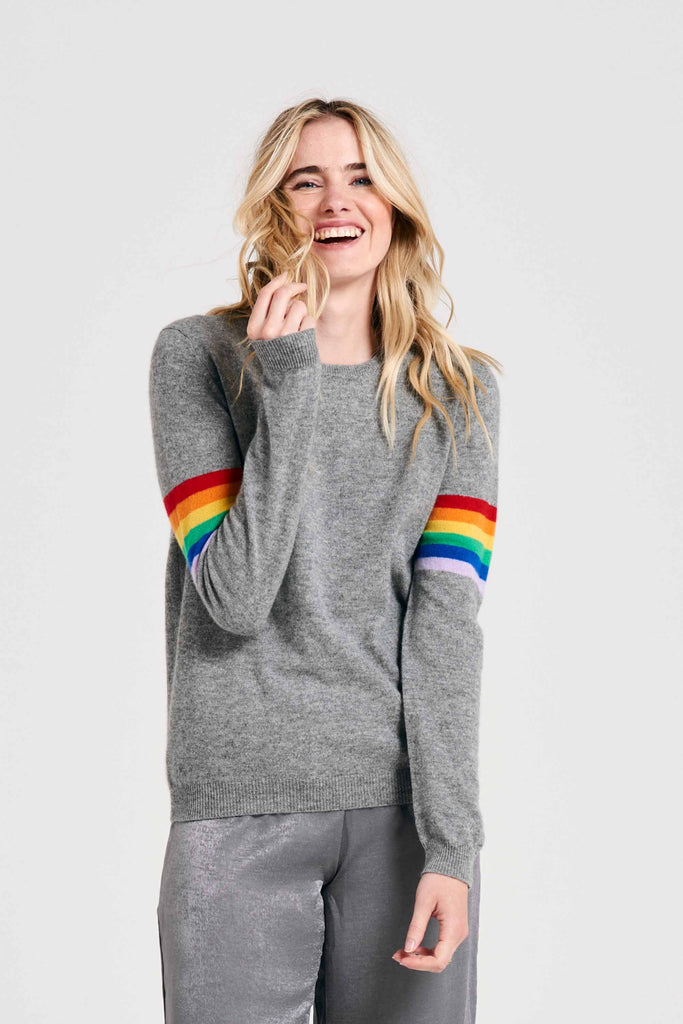 Blonde female model wearing Jumper1234 Rainbow arms cashmere crew in mid grey