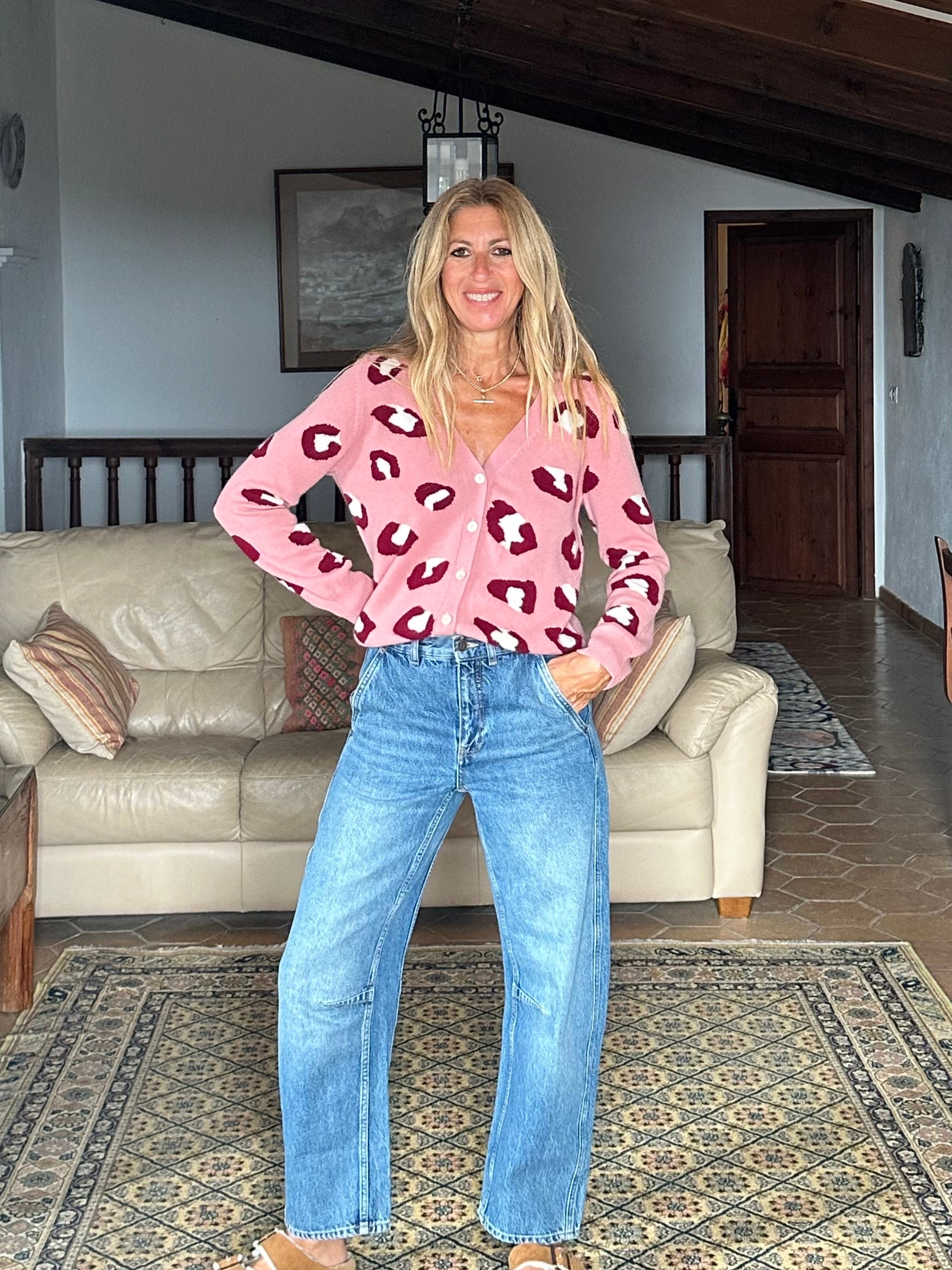 Gayle Rinkoff wearing Jumper1234 pink cashmere vee neck cardigan with burgundy and cream leopard intarsia