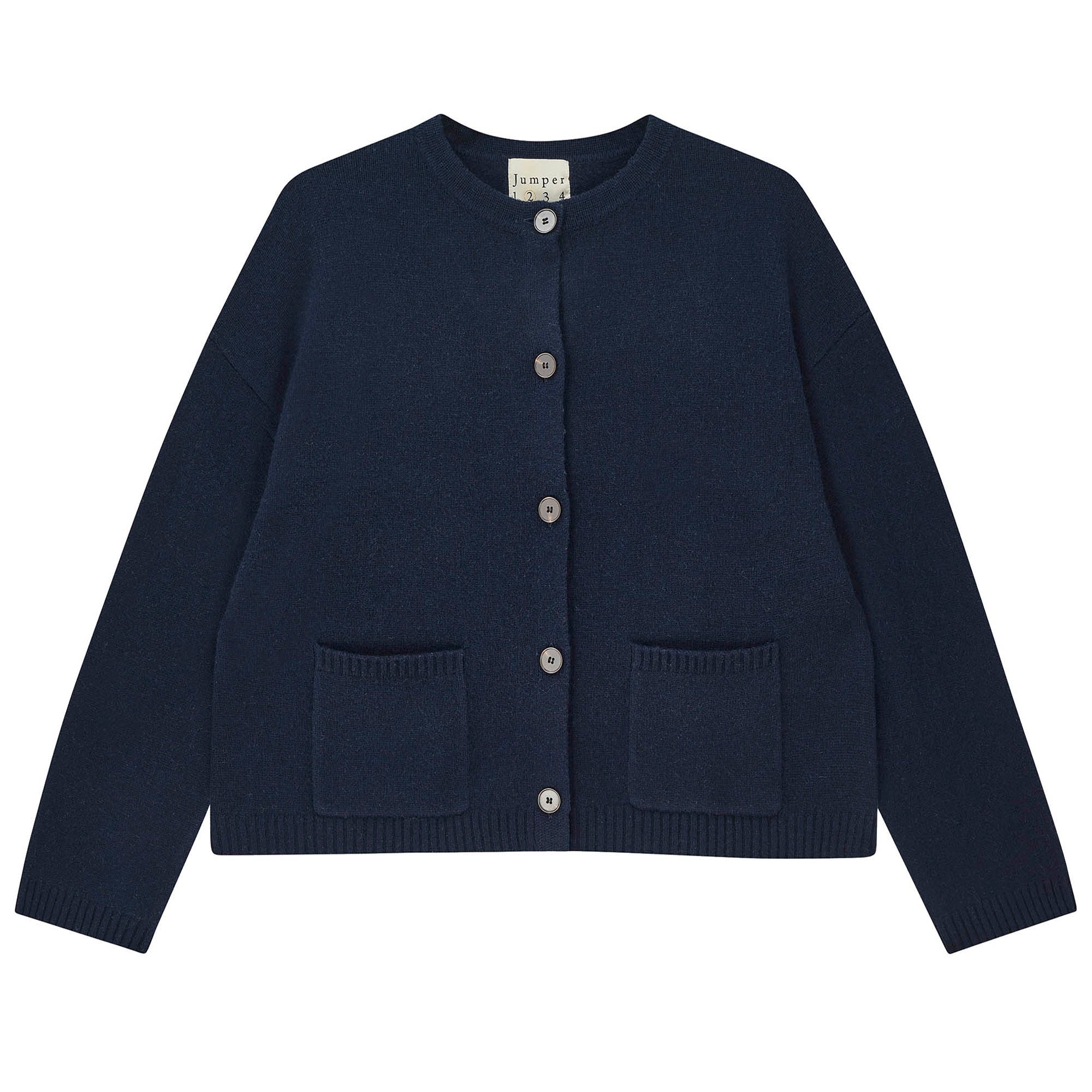 Jumper 1234 Heavier weight cashmere crew neck cardigan in navy. Oversize fit, two pockets and a fabulous cable detail at the back neck.