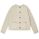 Jumper 1234 Heavier weight cashmere crew neck cardigan in stone. Oversize fit, two pockets and a fabulous cable detail at the back neck.