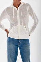 Model wearing Jumper 1234 cotton and cashmere White 'holey' zip up hoodie