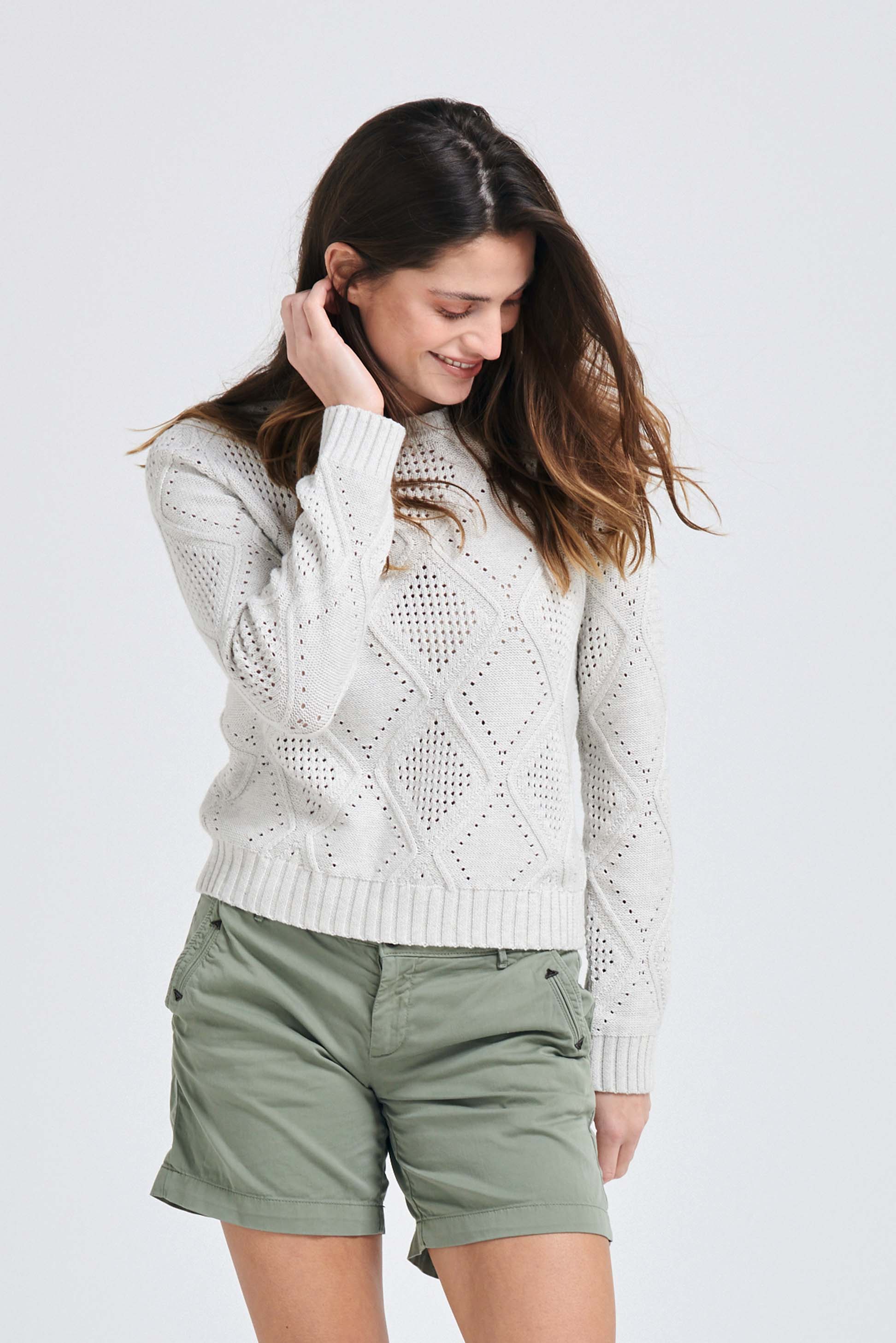 Brown haired female model wearing Jumper1234 Silver cotton crew neck jumper with a diamond texture stitch pattern