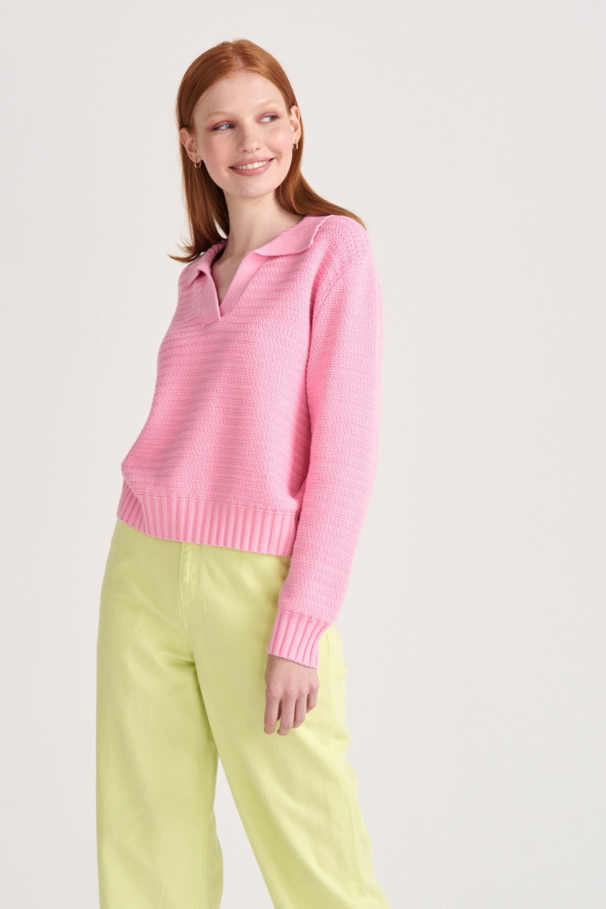 Red haired female model wearing Jumper1234 Pink cotton jumper with a collar in a fabulous all over herringbone stitch