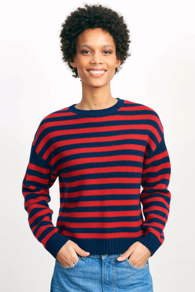 Brown haired female model wearing Jumper 1234 navy and red stripe cashmere and wool Guernsey 