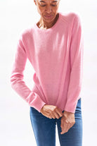 Model wearing Jumper1234  lightweight cashmere crew neck in pink