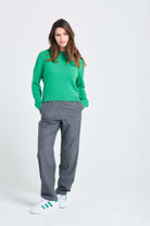 Brown haired female model wearing Jumper1234 Bright green lighter weight crew neck cashmere jumper