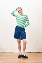 Female model wearing Jumper 1234  lightweight cashmere stripe crew neck in green 