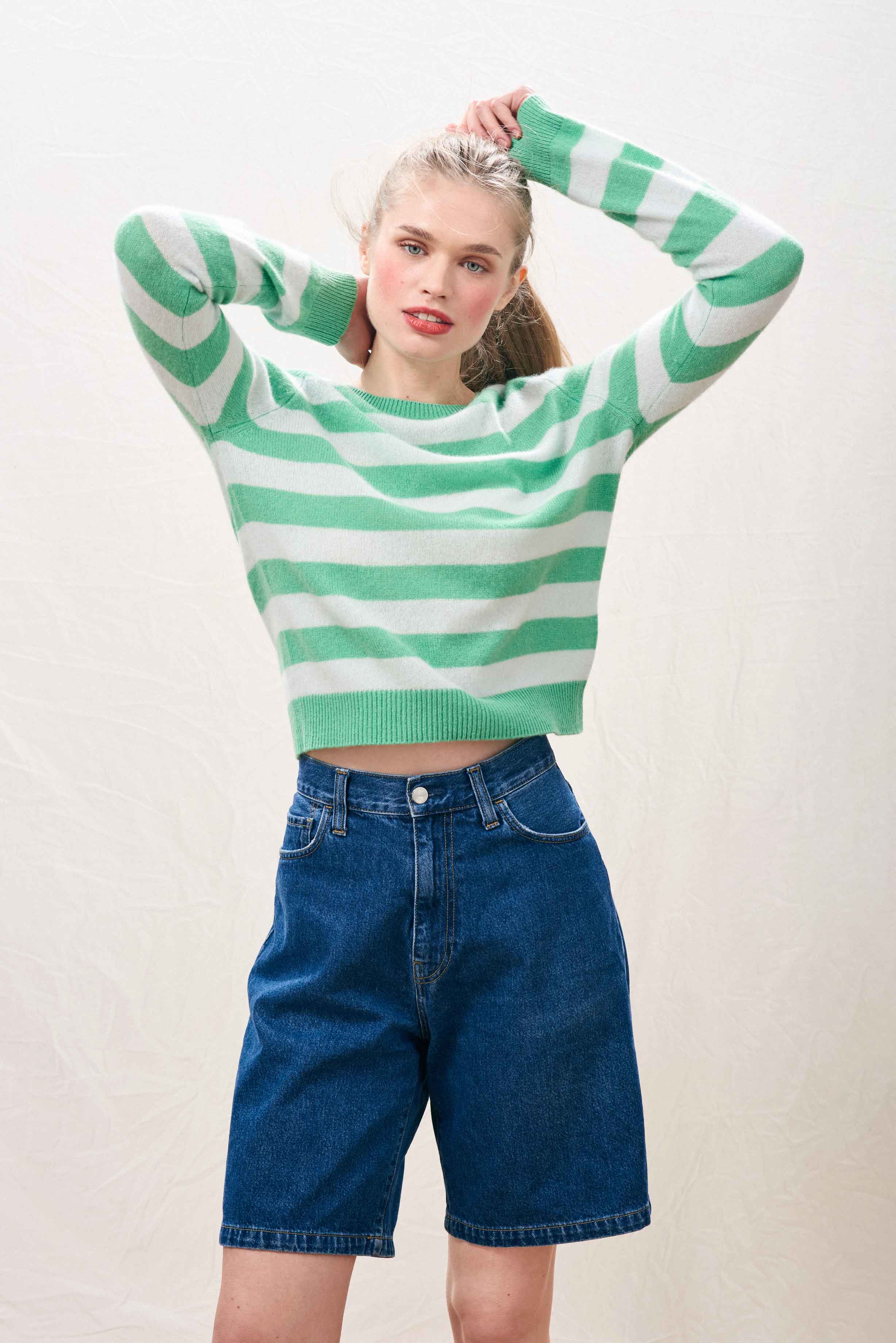 Female model wearing Jumper 1234  lightweight cashmere stripe crew neck in green 