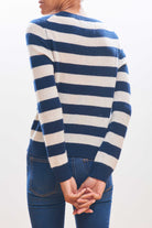 Model wearing  Jumper1234 cashmere stripe crew neck in navy and cream facing away from the camera