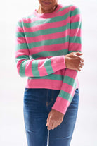 Model wearing Jumper1234 cashmere stripe crew neck in pink and mint