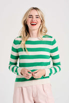 Blonde female model wearing Jumper1234 Stripe cashmere crew neck jumper in oatmeal and bright green