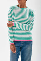 Model wearing Jumper 1234 cashmere little stripe crew with mint and cream stripes and a contrast pink tipping