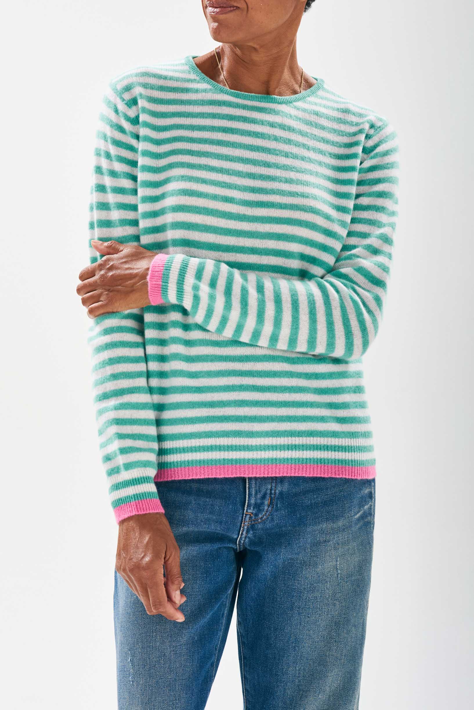 Model wearing Jumper 1234 cashmere little stripe crew with mint and cream stripes and a contrast pink tipping