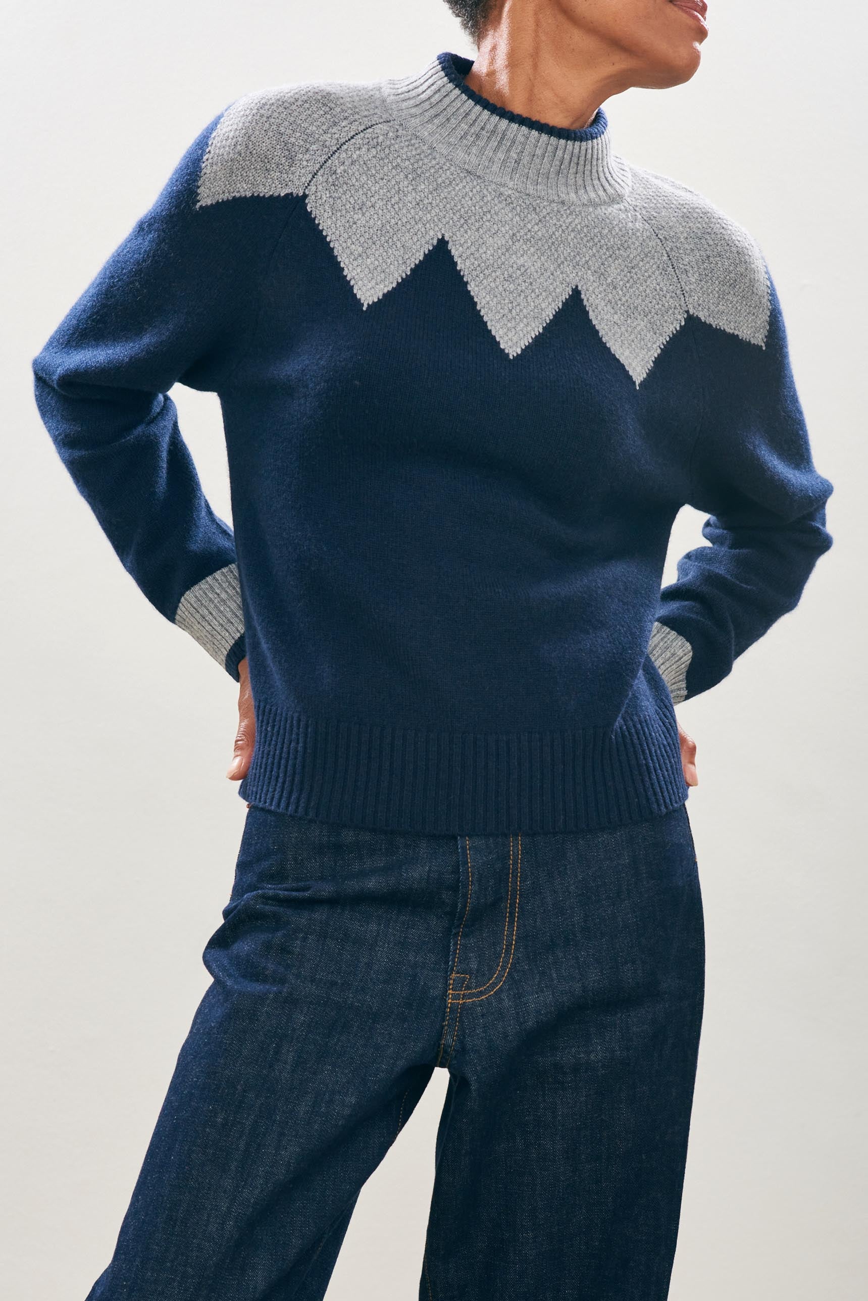 female model wearing Cashmere Wool Zig Zag Turtle in Grey and Navy close up
