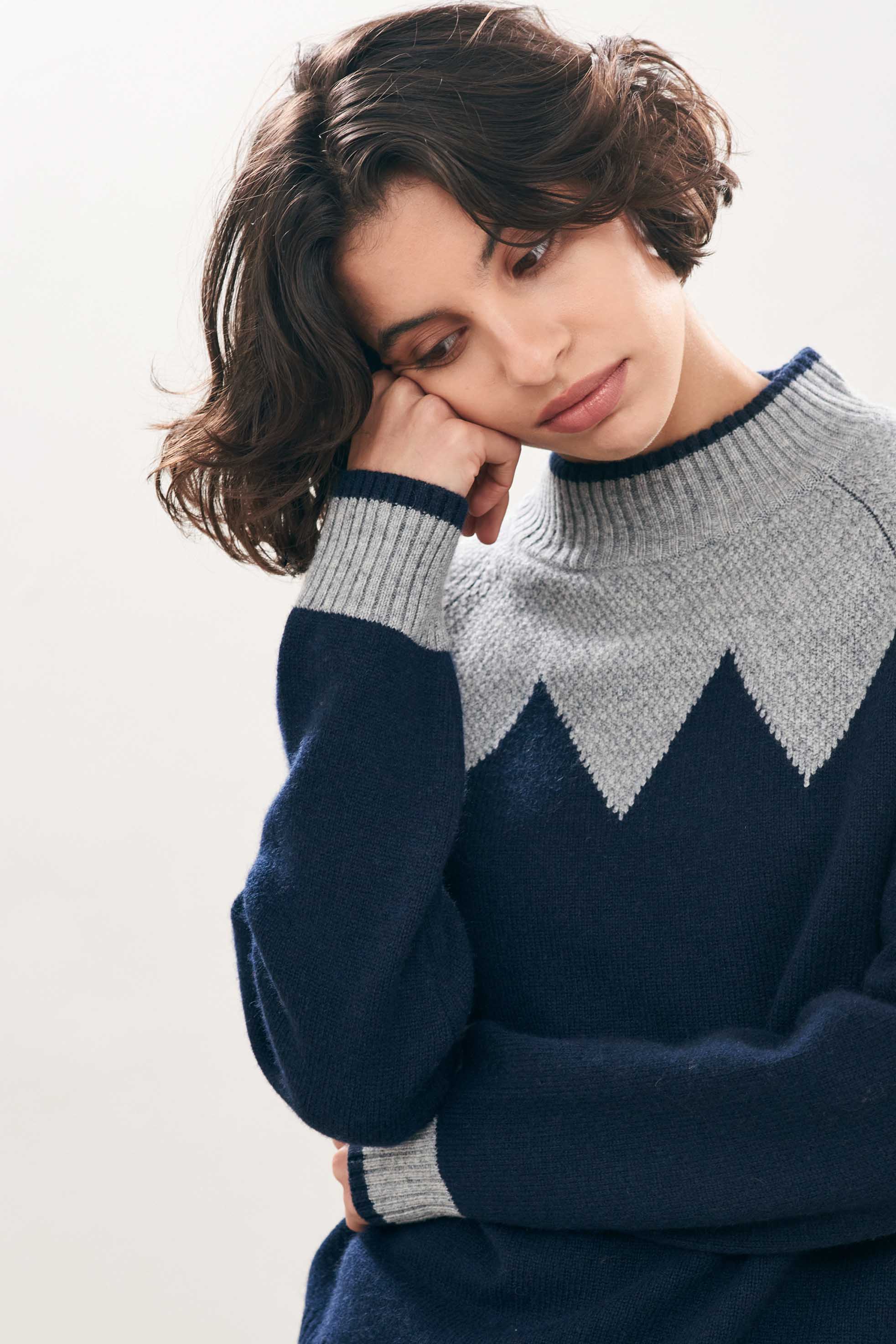 female model wearing Cashmere Wool Zig Zag Turtle in Grey and Navy close up facing towards the camera