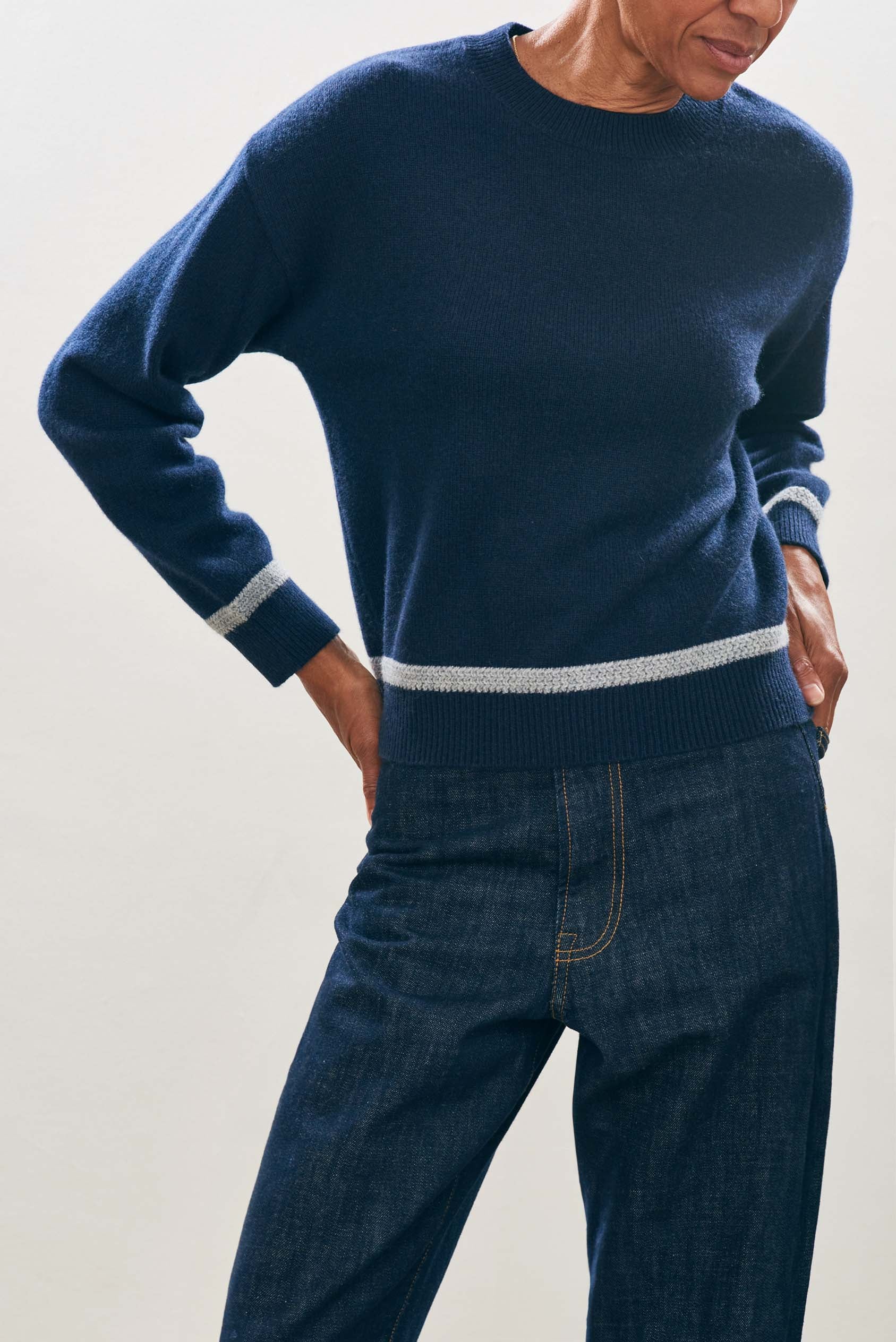 female model wearing jumper1234 Cashmere Wool Heavy Trim Crew in Navy and Grey close up 