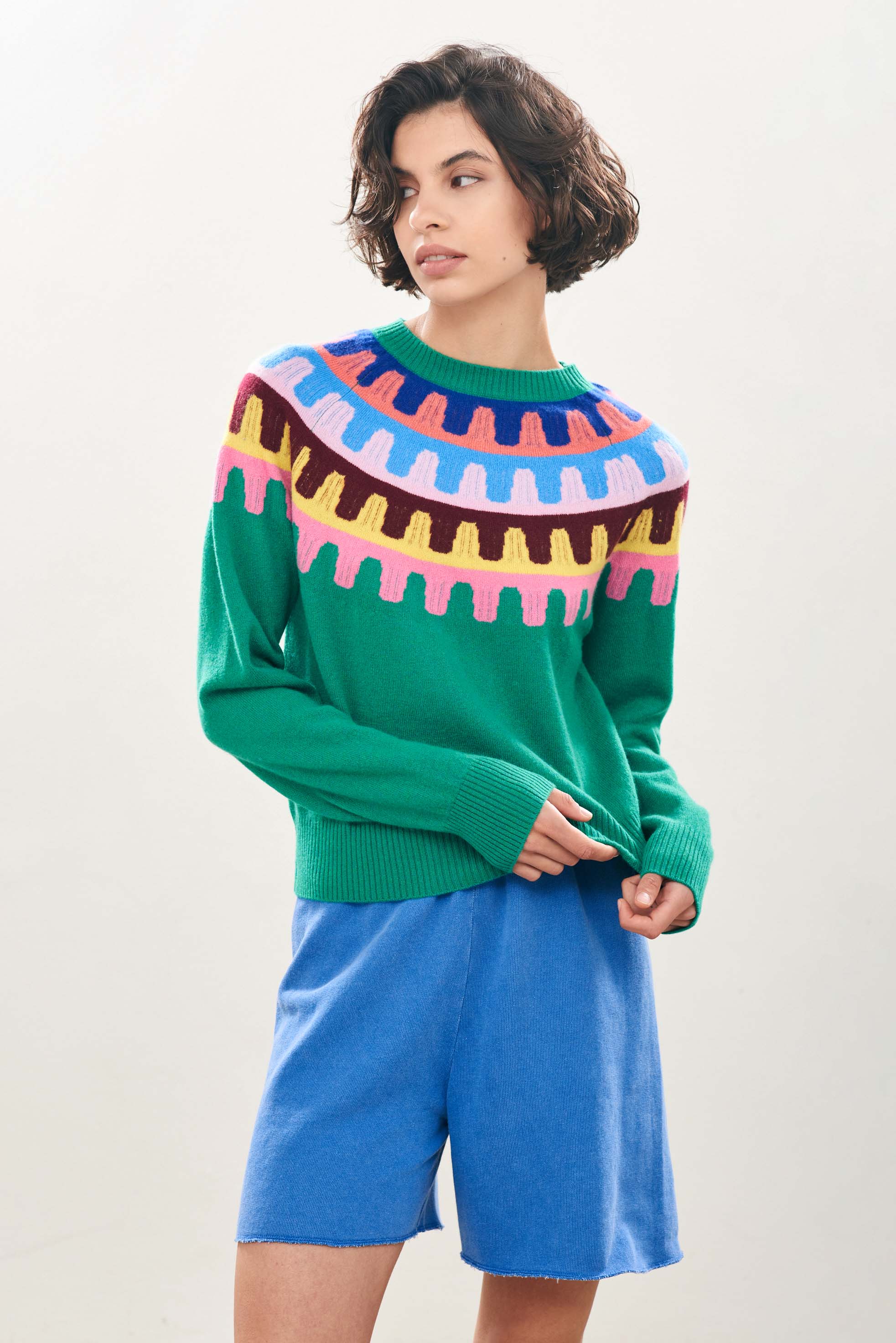 Female model wearing Jumper1234 Cashmere Rick Rack yolk Crew in Green facing towards the camera