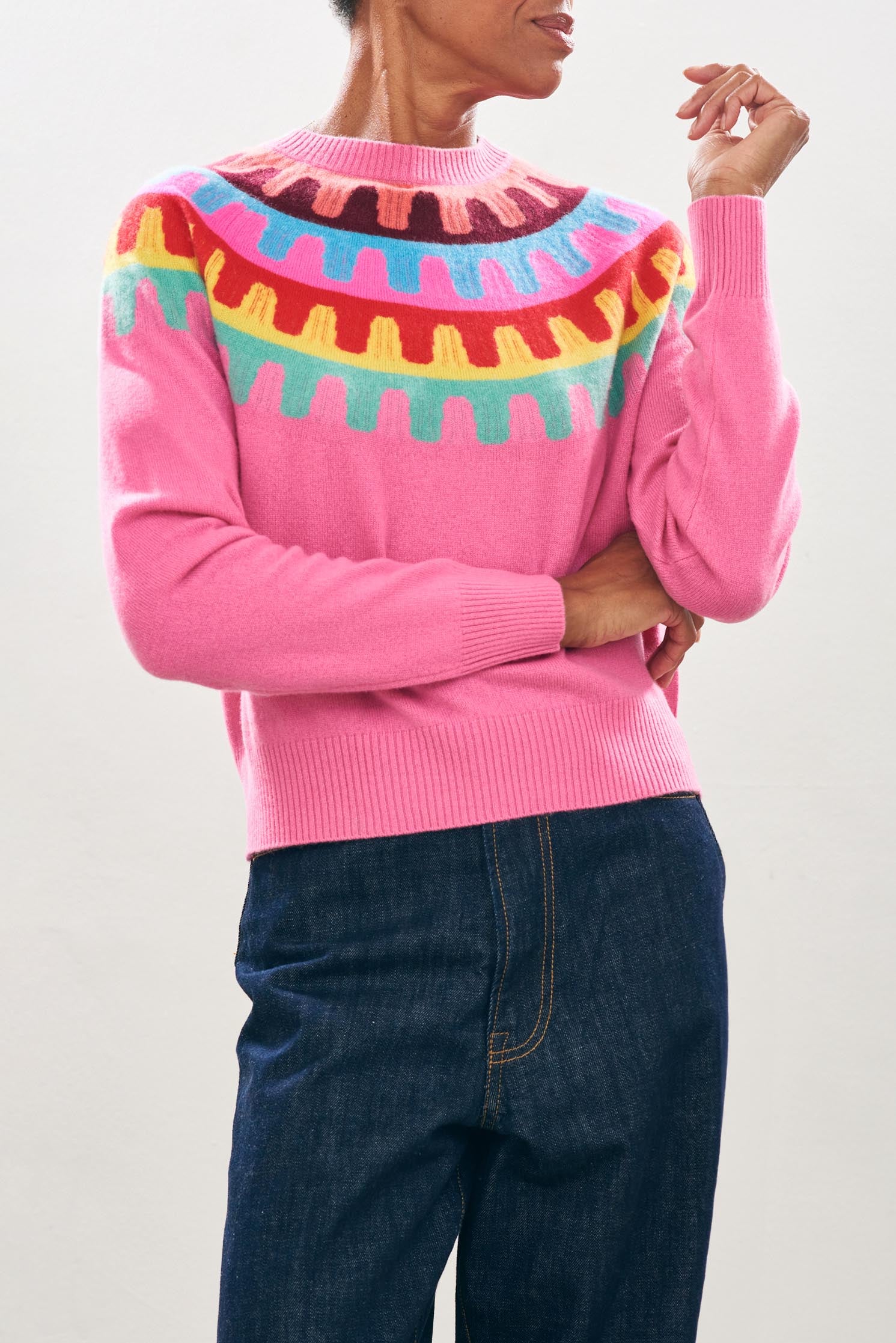 Female model wearing Jumper1234 Cashmere Rick Rack yolk Crew in Pink close up 
