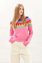 Female model wearing Jumper1234 Cashmere Rick Rack yolk Crew in Pink facing towards the camera