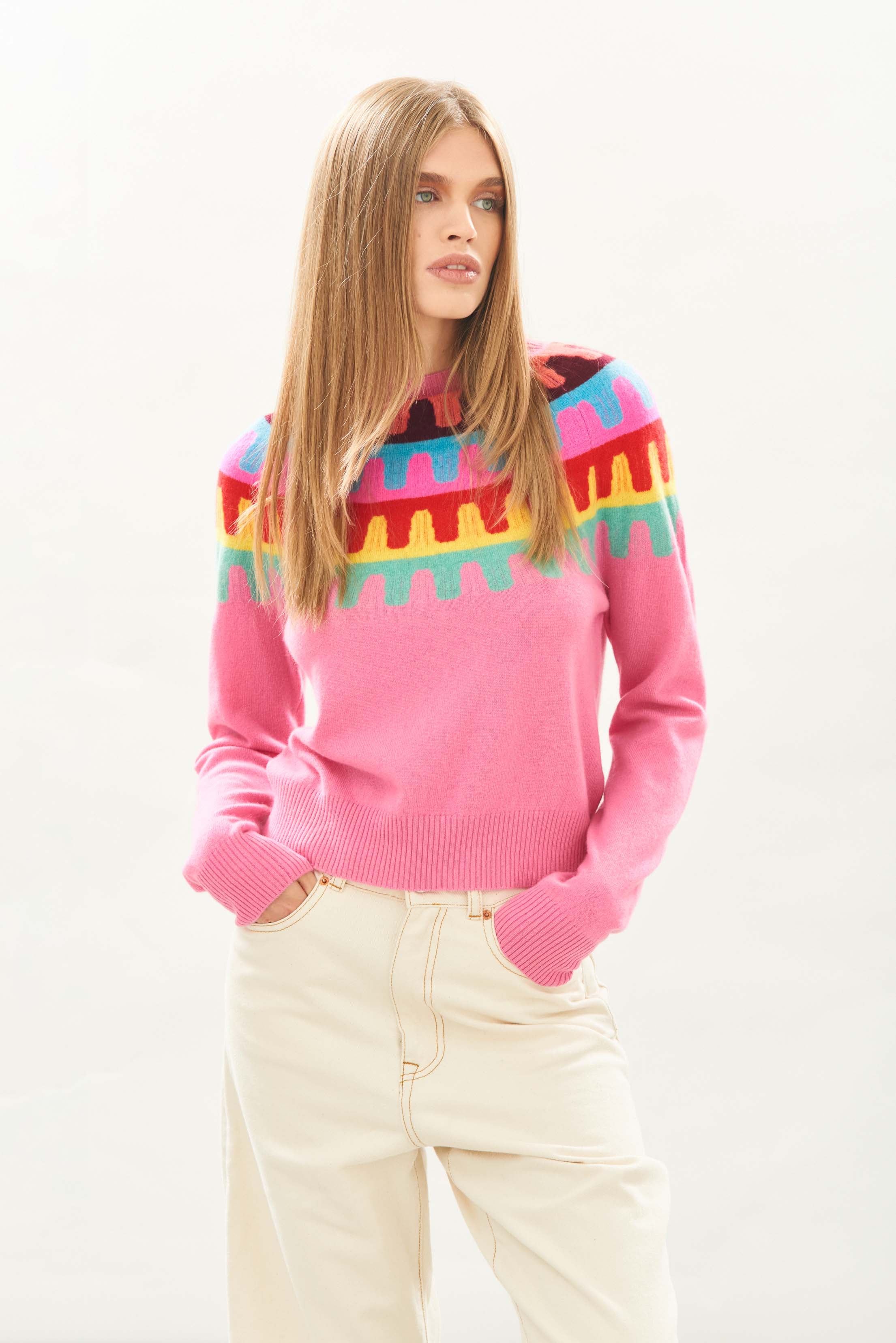 Female model wearing Jumper1234 Cashmere Rick Rack yolk Crew in Pink facing towards the camera