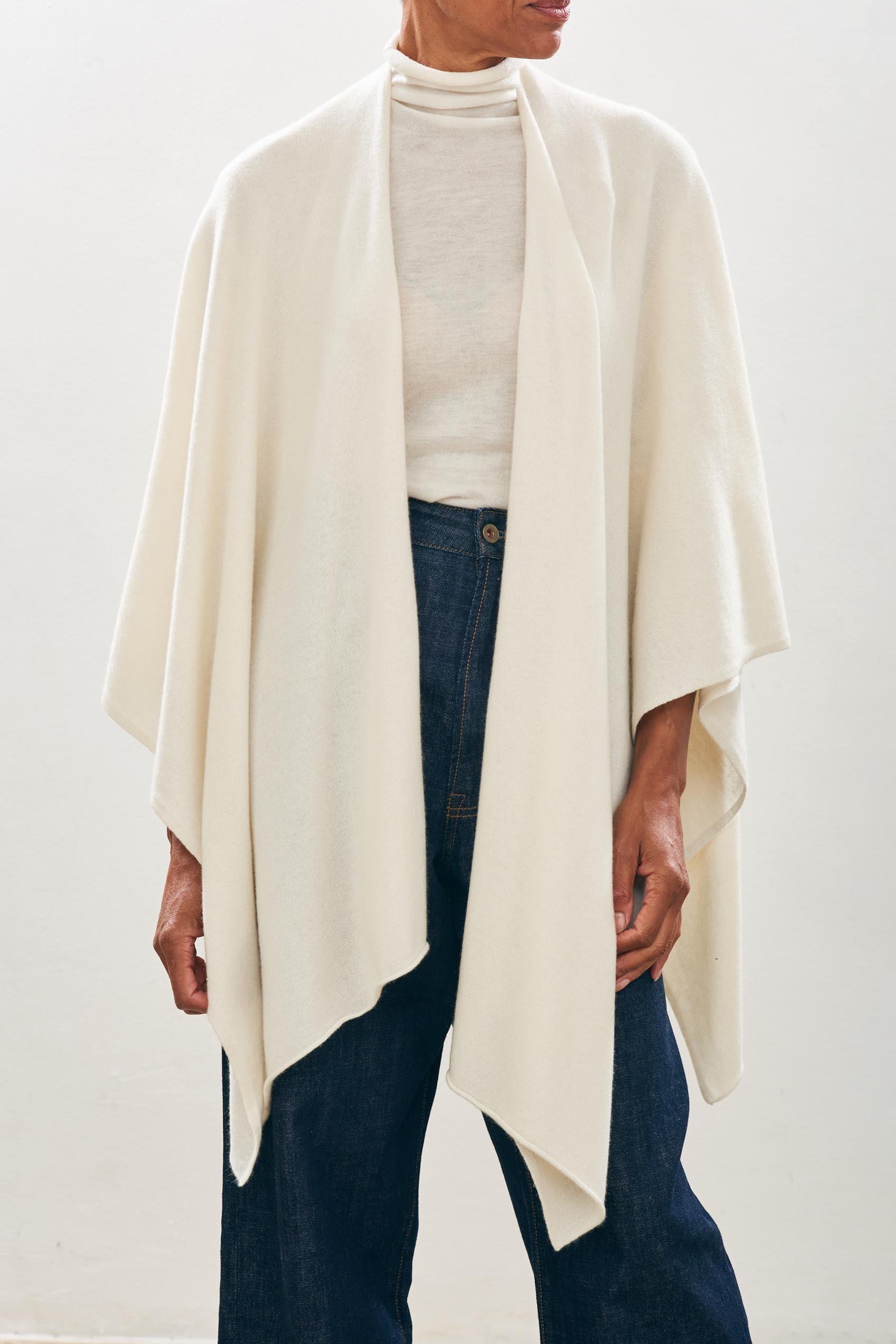 female model wearing jumper1234 Plain Cashmere Wrap in Cream close up 