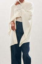 female model wearing jumper1234 Plain Cashmere Wrap in Cream close up 