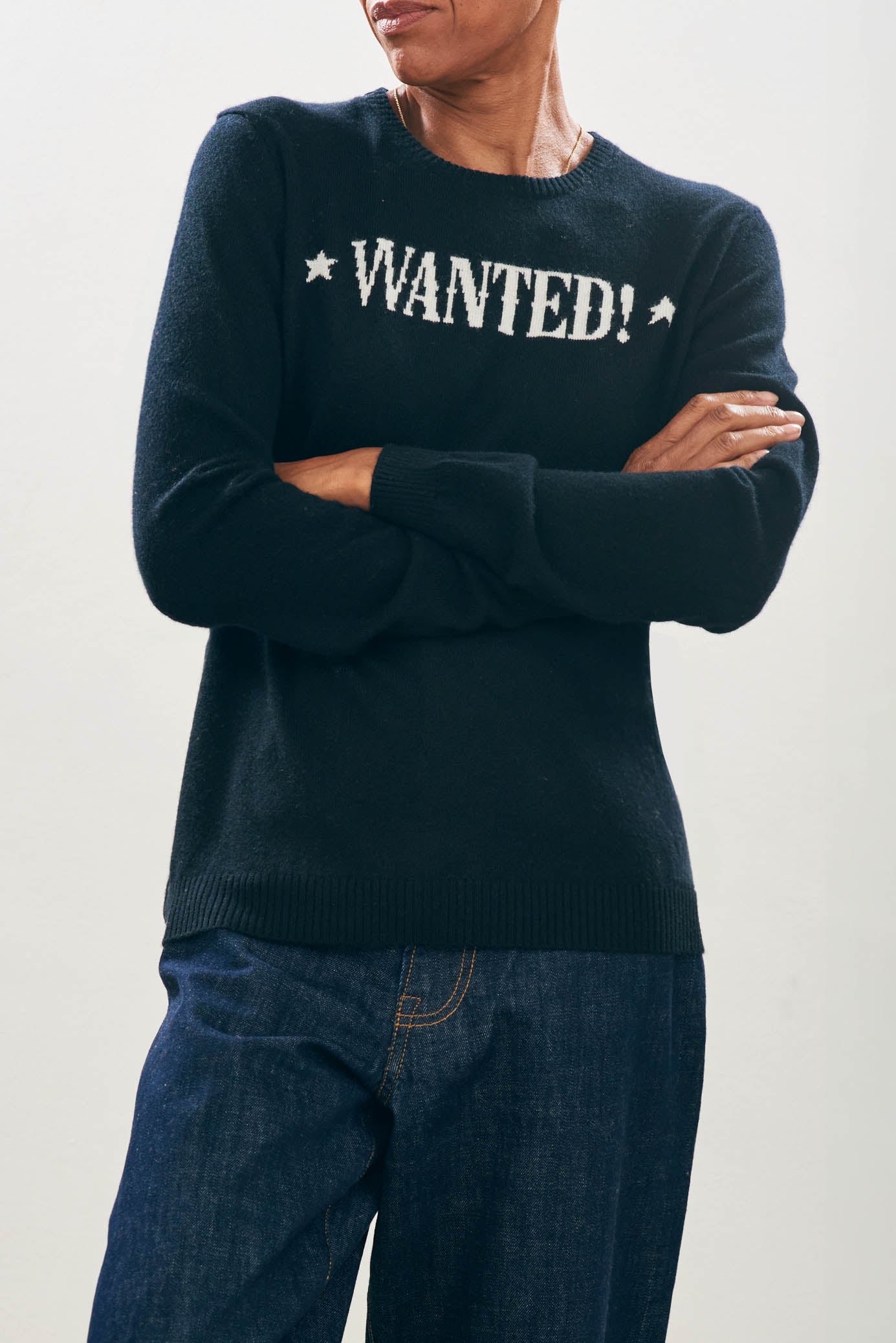 Female model wearing Jumper1234 Cashmere Wanted Crew in Black and Cream