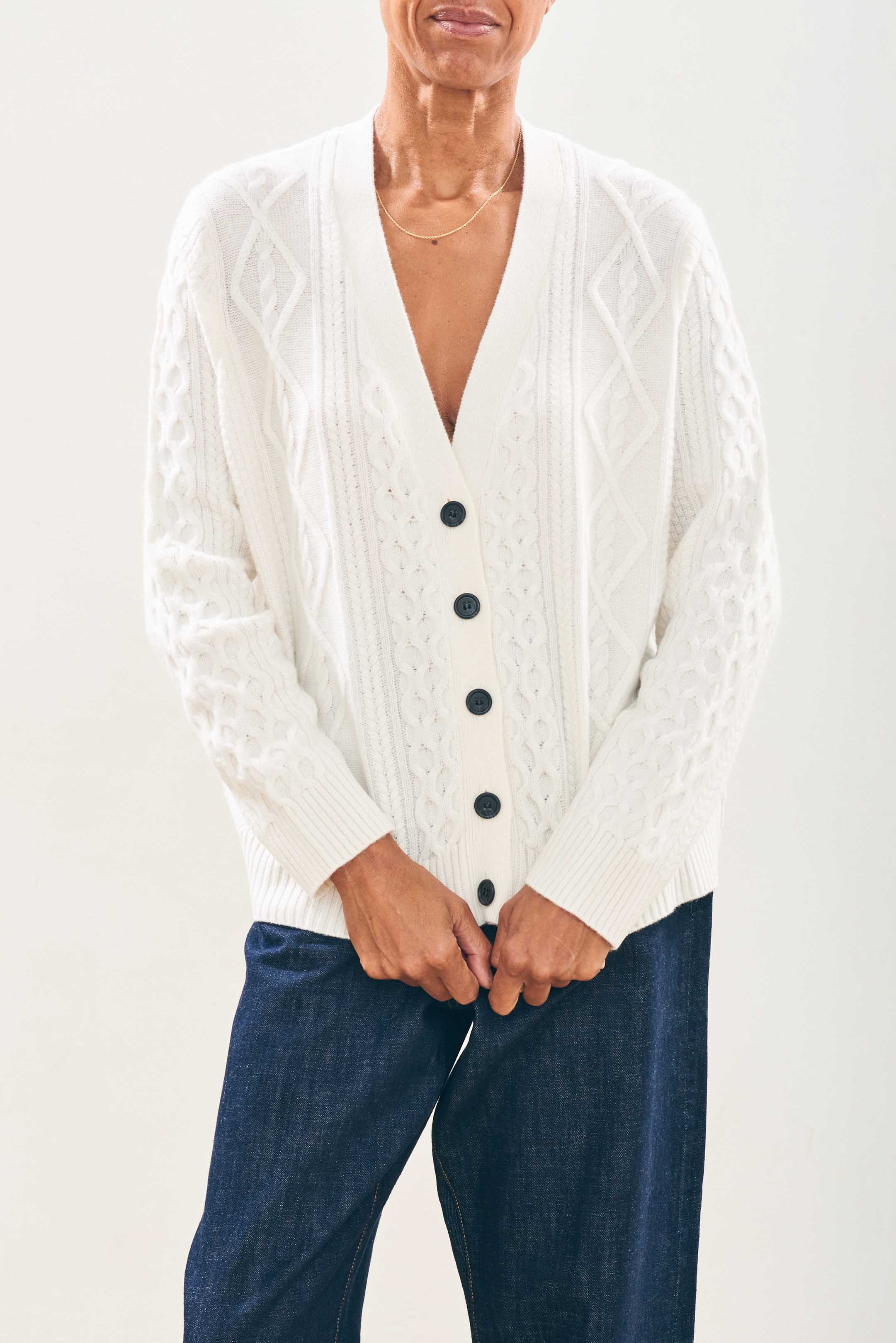 Model wearing Jumper1234 Cashmere Wool Aran Cardigan in Cream