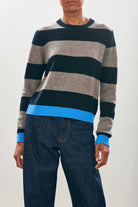 Female model wearing Cashmere Contrast Stripe Crew in Black, Moose and Sky