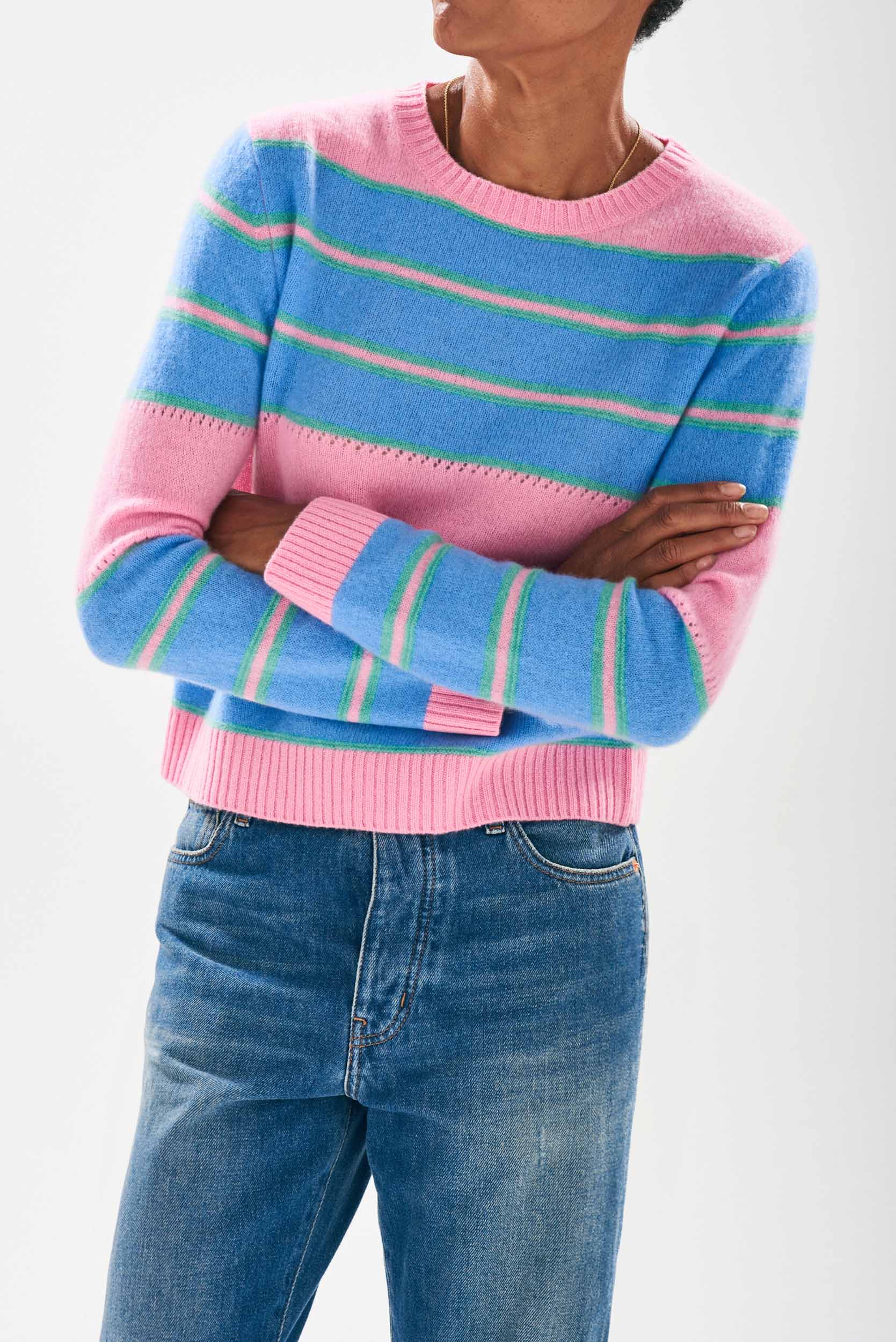 Model wearing Jumper 1234 cashmere candy and sky blue stripe crew neck cashmere jumper with textured 'hole' details and a little mint green stripes