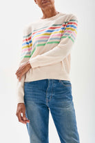 Female model wearing Jumper 1234 cream cashmere crew neck jumper with multi colour stripe block, with a lovely button detail at the back neck