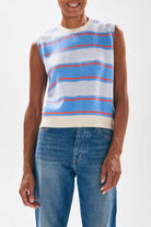 Model wearing Jumper1234 Deckchair stripe tank. Pale blue and sky striped cashmere crew neck tank with oatmeal ribs and a narrow tangerine stripe too