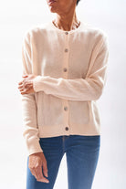 Model wearing Jumper1234 Cream cashmere cardigan