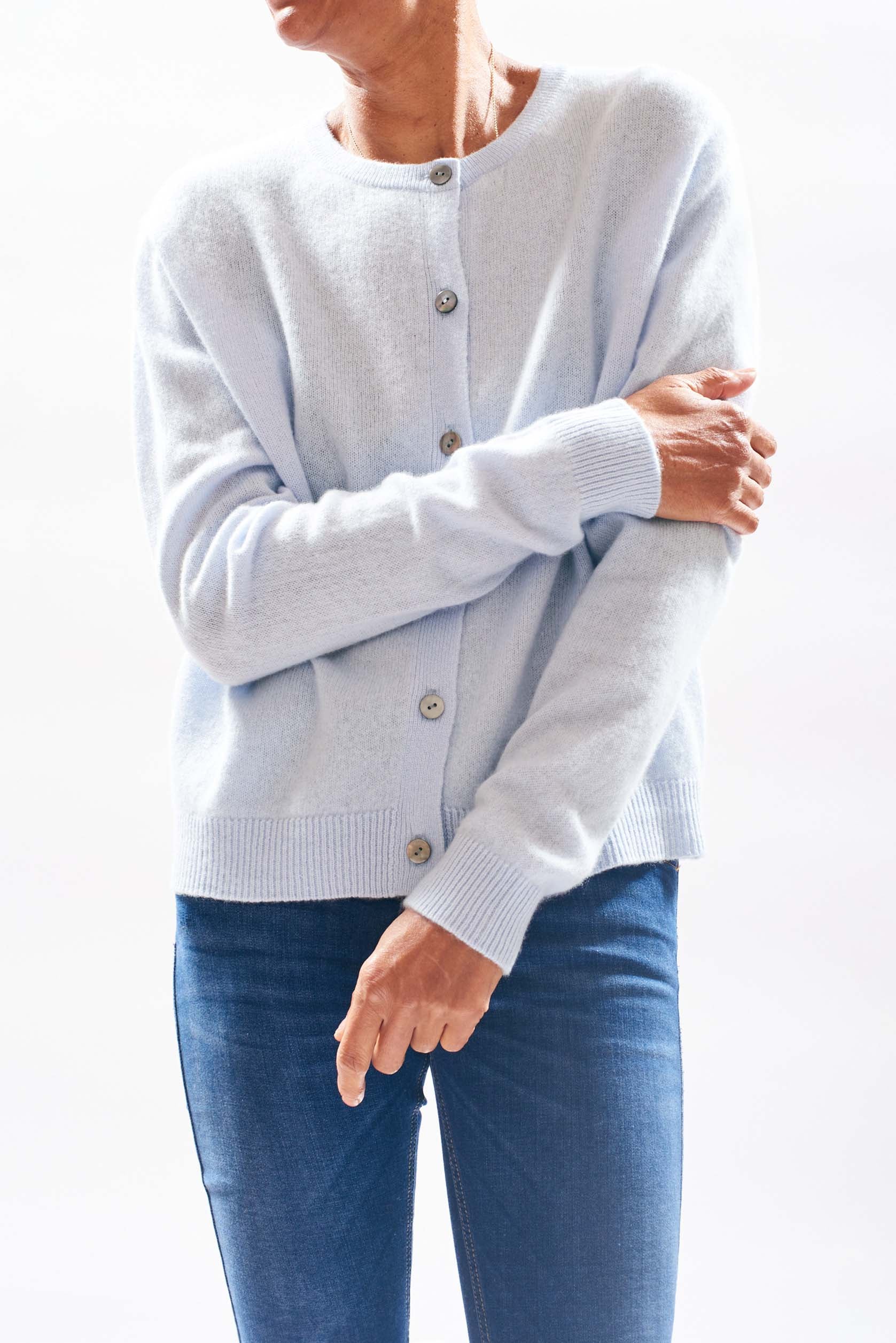 Model wearing Jumper1234 Pale blue cashmere cardigan