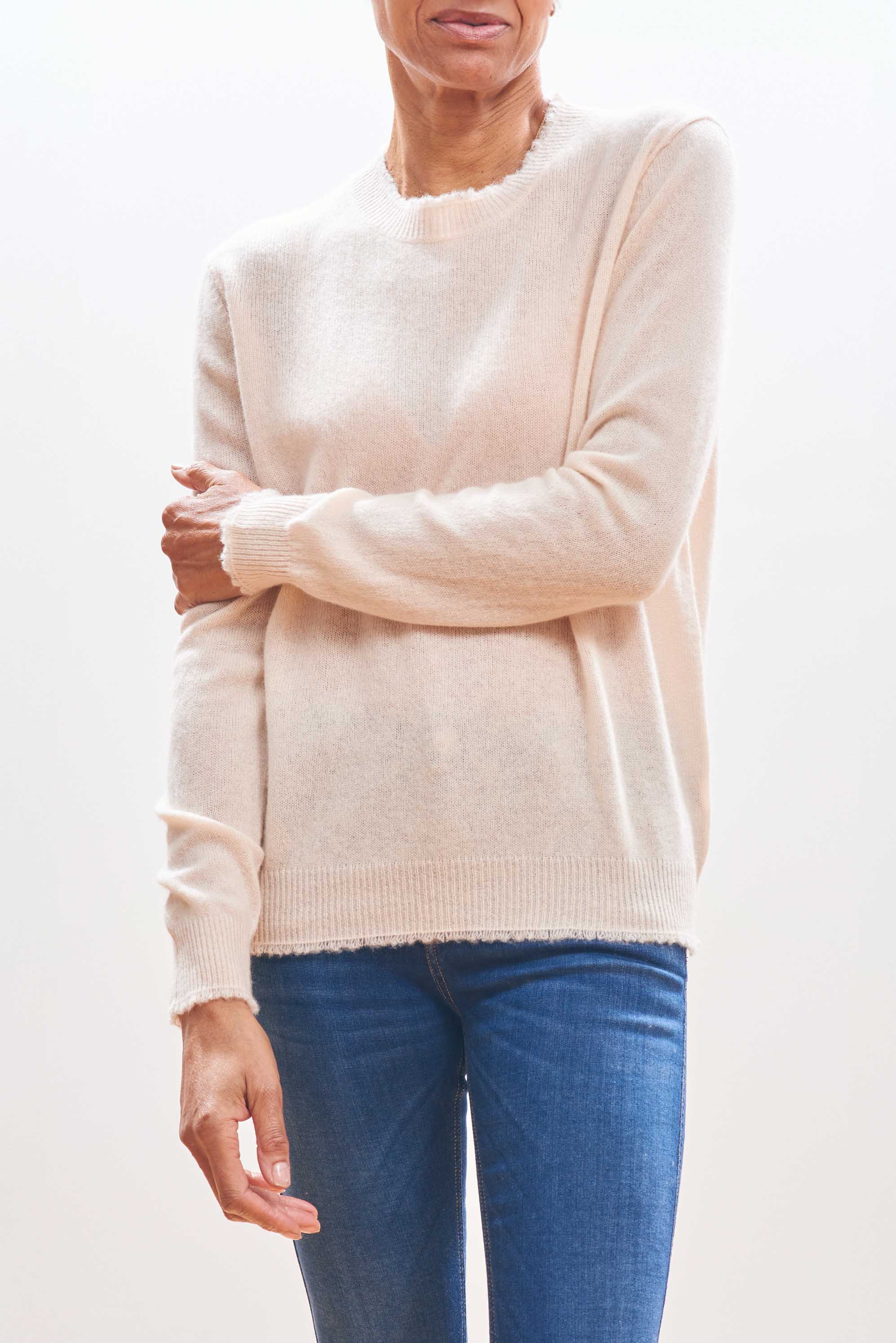 Model wearing Jumper1234 Cream cashmere crew neck with 'distressed' ribs