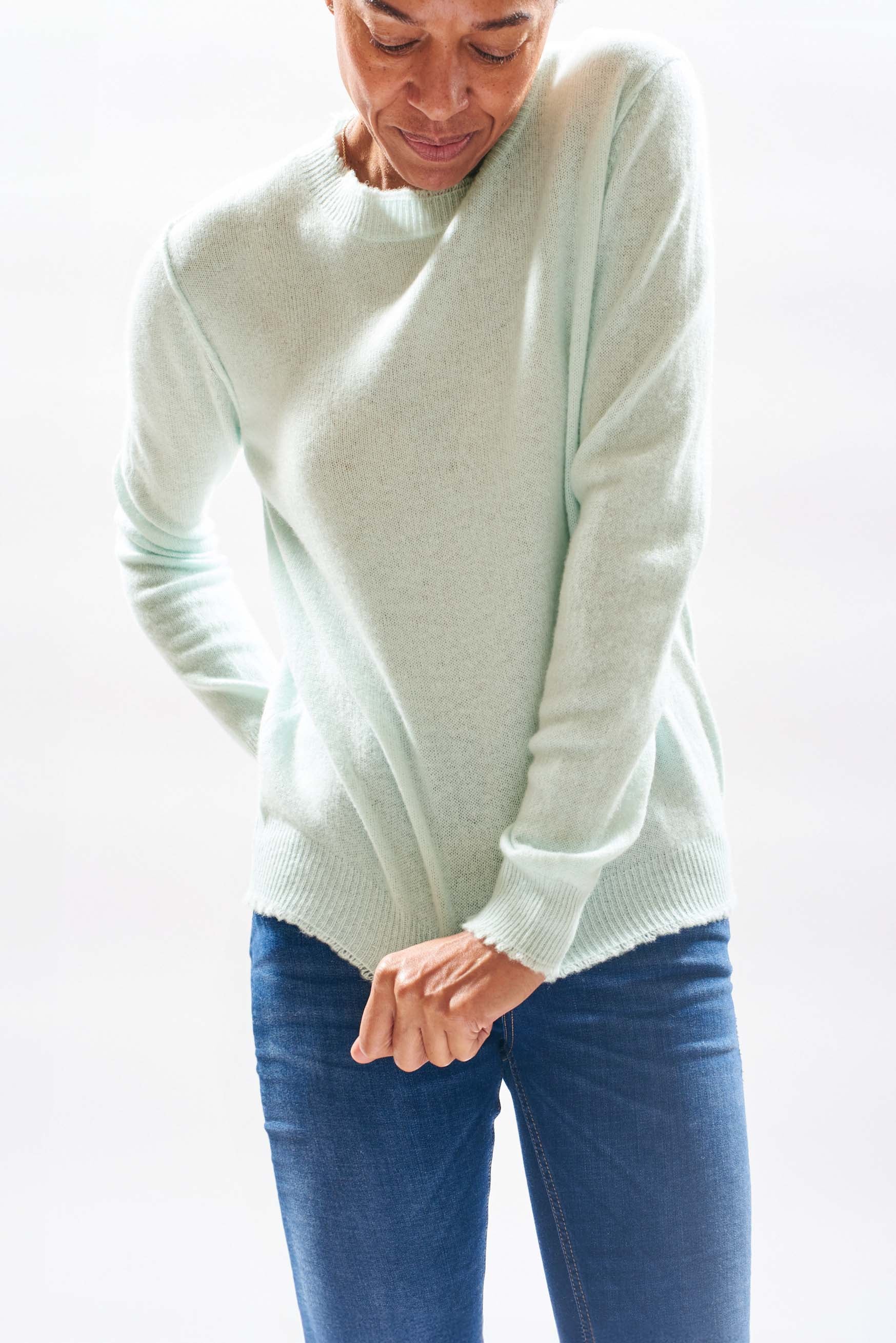Model wearing Jumper1234  Pale green cashmere crew neck with 'distressed' ribs