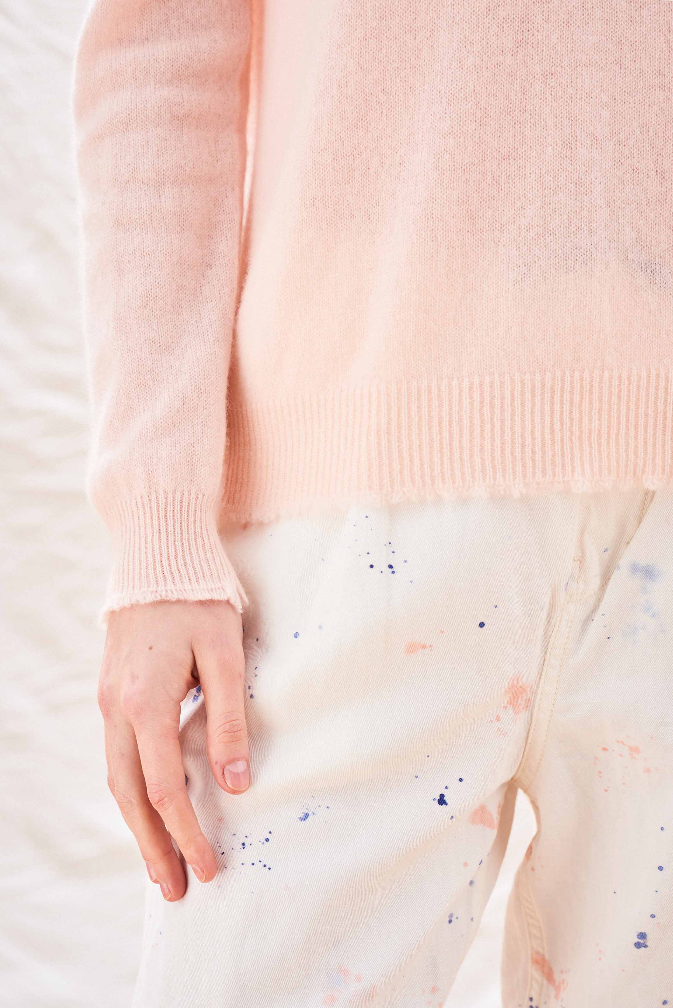 Jumper 1234 Pale pink cashmere crew neck with 'distressed' ribs. Close up sleeve rib detail.