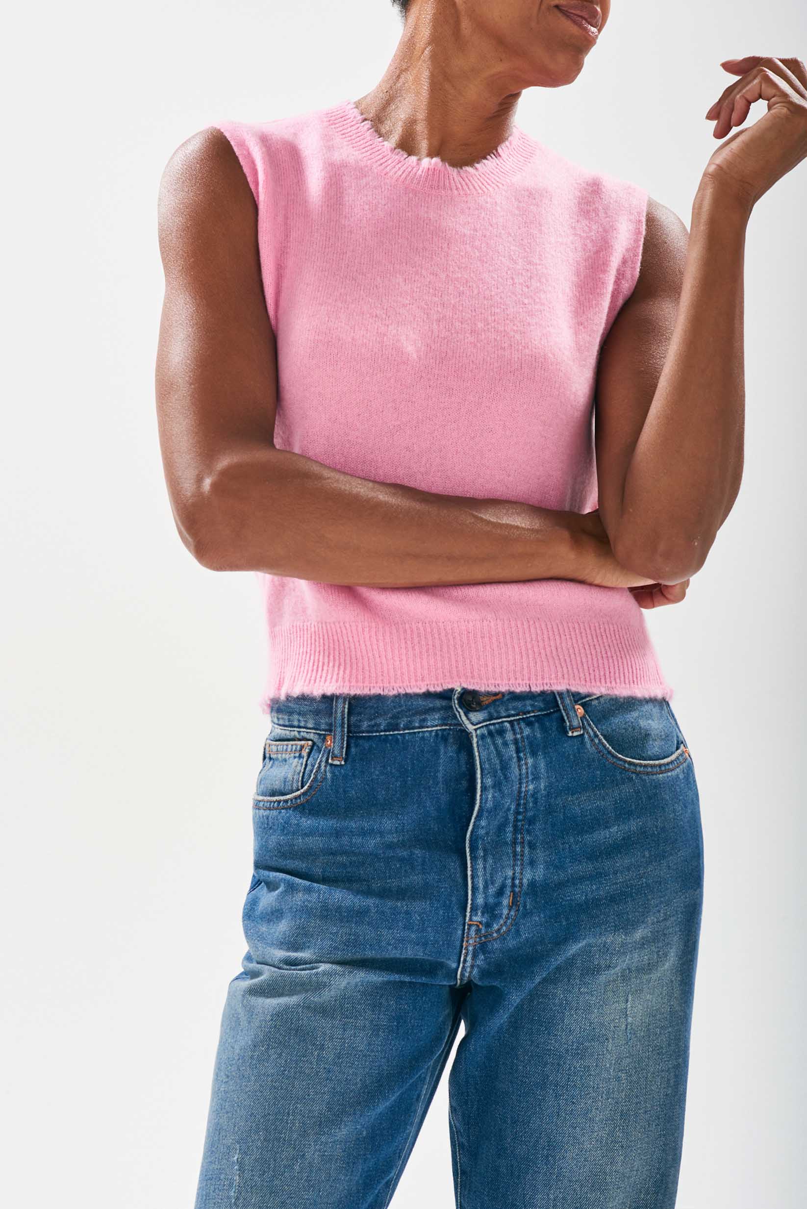 Model wearing Jumper1234 Candy pink cashmere crew neck tank with 'distressed' ribs
