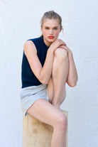 Model wearing Jumper1234 Navy cashmere crew neck tank with 'distressed' ribs