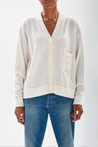 Jumper1234  Cream boyfriend vee neck cashmere cardigan with organic light brown top stitching detail and a pocket