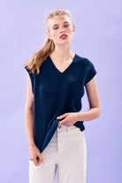 Model wearing Jumper1234 Oversize mesh cashmere vee neck tank in navy