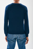Model wearing facing away from the camera Jumper1234 Navy cashmere crew neck jumper with red embroidered lifeguard detail