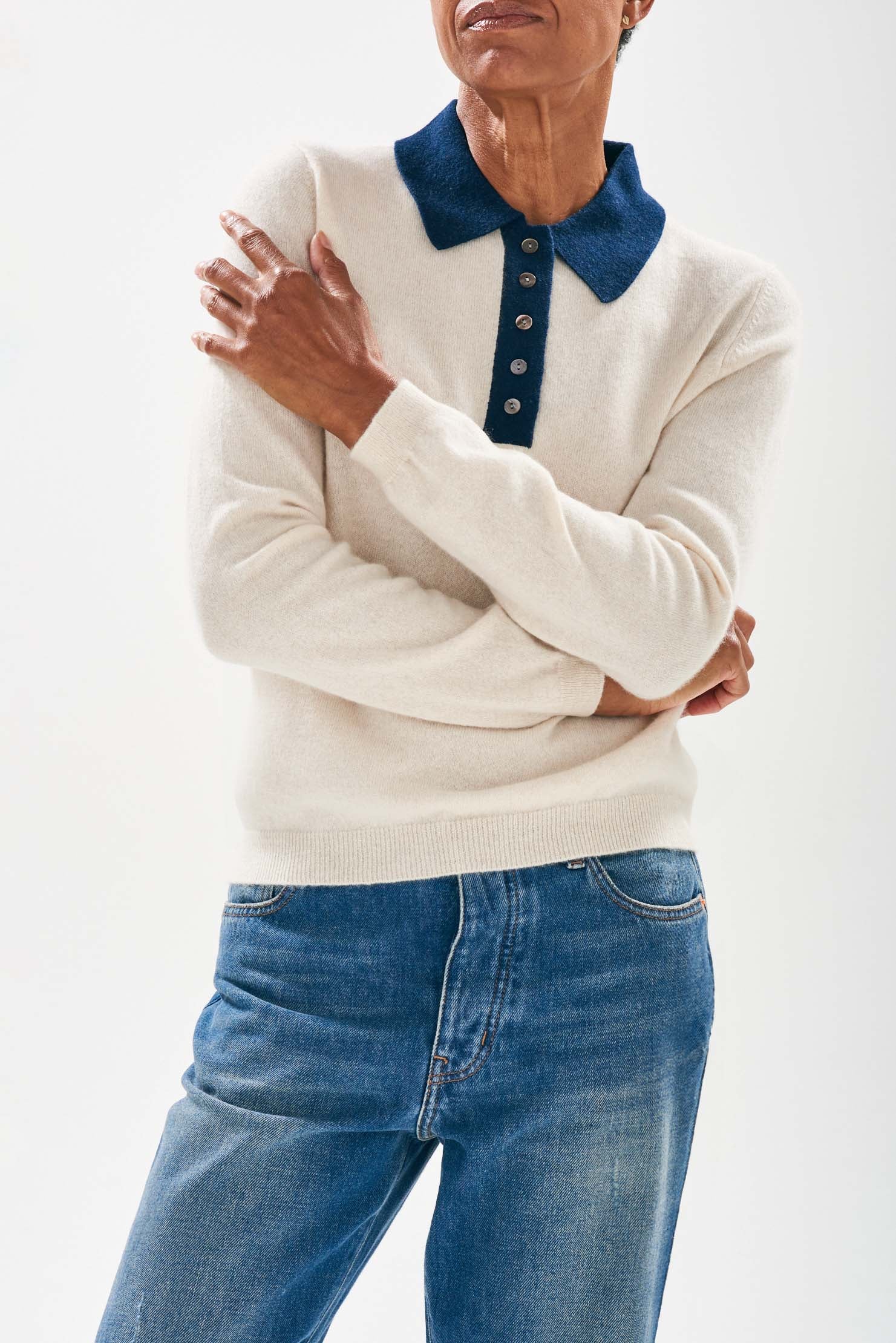 Model wearing Jumper1234 Oatmeal cashmere polo shirt with a contrast navy collar